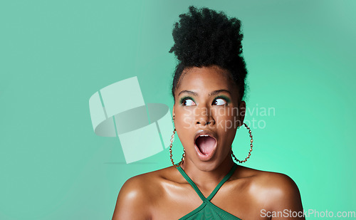 Image of Surprise, trendy black woman and green studio background portrait with wow secret and style. Fashion and african american female makeup girl with deal, discount and gossip smile with mockup space