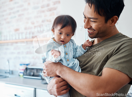 Image of Down syndrome, baby and father bonding in their home with a proud parent caring for special needs infant in India. Love, family and child with happy man or dad carrying newborn with a disability