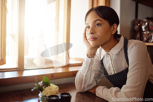 Image of Restaurant, stress and waitress thinking of future goal while frustrated working at a cafe. Tired black woman, waiter or cafe worker with burnout and idea for small business at a coffee shop