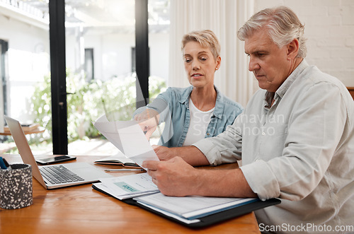 Image of Retirement couple budget, finance and investment planning, loan and paper bills for online banking at home. Senior man, woman and people reading tax money report, cash savings and admin document note