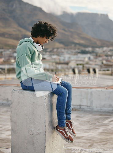 Image of Relax writing woman on outdoor rooftop for song lyrics inspiration, motivation and peace on Hollywood roof building. Pen, notebook and freedom for young gen z girl, music artist or creative musician