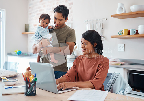 Image of Internet, family and parents doing research on down syndrome with baby on a laptop in their house. Mother and father with smile for child and working on taxes or finance budget on the computer