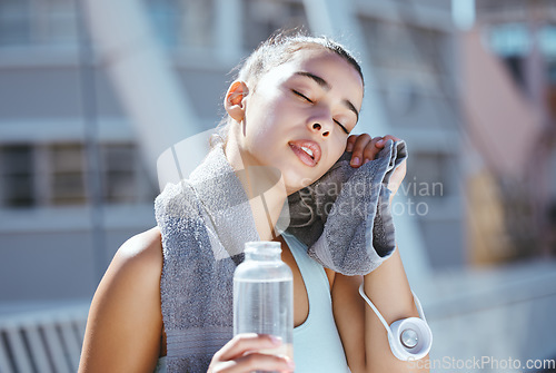 Image of Water bottle, sweat and tired runner woman in urban city for outdoor workout results or exercise challenge in summer. Young sports athlete girl and fitness gear for healthy cardio training motivation