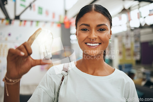 Image of Light bulb, idea and student with classroom innovation, learning inspiration and education teaching motivation. Teacher or college woman with lightbulb icon for problem solving and research strategy