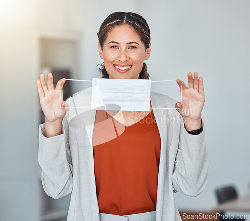 Image of Covid, face mask and happy woman holding a medical and corona safety product. Covid 19, instruction and healthcare coach woman with a happy smile portrait teaching how to use health care masks