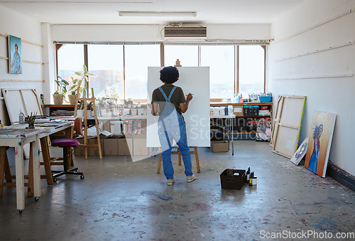 Image of Painting, canvas and creative black woman artist in studio workshop inspiration for oil or watercolor design. Creativity, drawing or sketch painter student girl with project idea on easel in New York