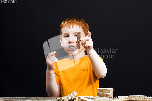 Image of smeared with waffle crumbs, a boy