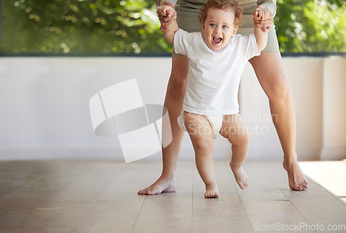 Image of Baby boy, learning and walking with mom in support, first steps and healthy body development for children. Mother holding hands in teaching excited, smile and happy young kid balance, care and growth