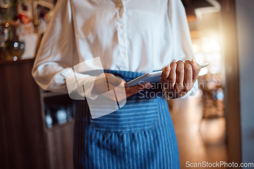 Image of Waitress hands, tablet and restaurant small business owner fine dining, fast food and coffee shop in online menu service. Closeup woman staff worker, digital app connect and hospitality cafe catering