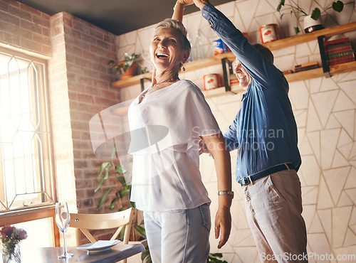 Image of Love, happy family and dance with elderly couple celebrating and dancing to music in their home together. Wellness, stress relief and freedom by active seniors bonding and being playful and romantic