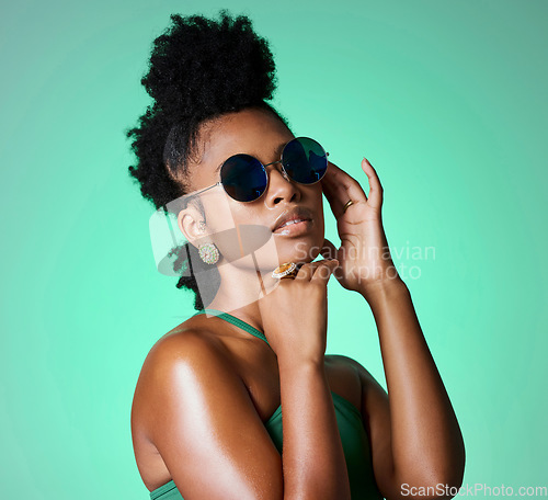 Image of Fashion, beauty and retro black woman with sunglasses for vintage style, trend or eye protection. Face accessory, gen z and cool African girl or person with funky hairstyle, hipster shades and trendy