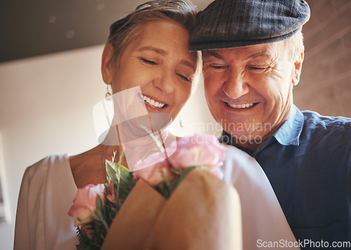 Image of Love, hug and old couple with flowers as a gift in celebration of a happy birthday, marriage and valentines day. Romance, smile and senior woman with elderly partner to celebrate retirement milestone