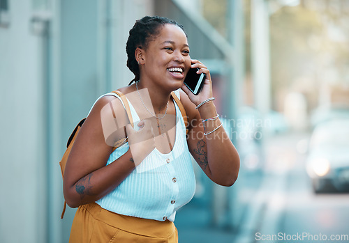 Image of Black woman, phone and happy in city on call outdoor while laughing in street. Plus size woman, smartphone and walking in road, smile and real excited to talk on cellphone on travel to San Francisco