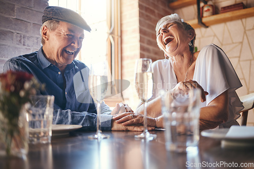 Image of Love, laughing and old couple holding hands at a restaurant on a romantic wine date in celebration of a happy marriage. Smile, relaxed and senior woman enjoying glass of champagne with funny partner