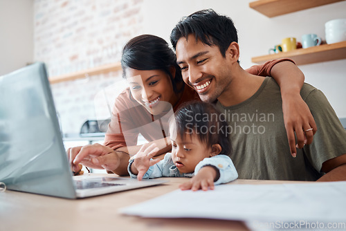 Image of Mom, dad and baby in kitchen with laptop, happy family from Mexico checking online payment or video call. Mother, father and child with down syndrome at computer in home streaming educational video.