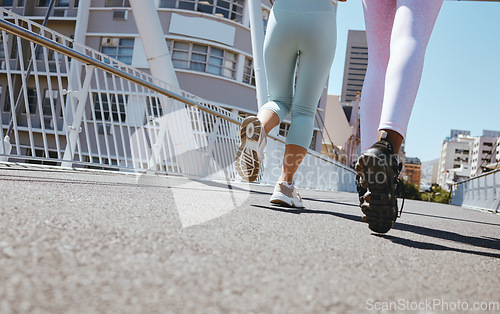 Image of Women workout in city, fitness legs running shoes and step marathon motivation on Miami street. Friends training together in summer, outdoor urban road exercise and healthy strong cardio marathon
