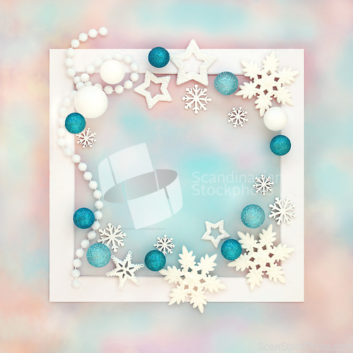 Image of Abstract Christmas White Bauble Design on Rainbow Sky Background