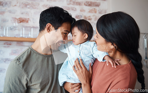 Image of Happy family, down syndrome baby and love in home, bonding and caring for infant child. Support, care and parents, father and mother spending time together with newborn girl with disability in house.