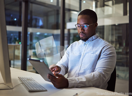 Image of Black businessman, tablet and data analysis with computer in night office for digital marketing software, cybersecurity code or kpi. Thinking programmer, developer or website designer with technology