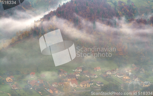 Image of Mountain village through the clouds