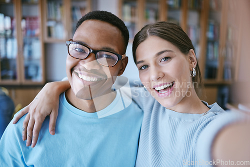 Image of University students and library friends selfie smile together in education literature centre. Happy, cheerful and optimistic interracial college friendship photograph in educational campus.