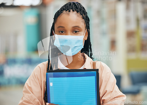 Image of Student, covid and a portrait of black woman with face mask and file at university or college. Safety, protection from virus infection and education, young african girl learning during a pandemic.