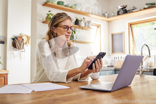 Image of Woman, laptop or fintech phone app in house or home kitchen for finance budget, investment accounting or insurance taxes. Thinking mature person with technology, paper or document for retirement loan