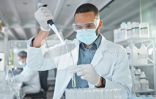 Image of Covid, scientist man and vaccine research with medicine analysis test tube and chemical pipette in a science lab. Medical development, cure and an expert working on new virus cure in laboratory