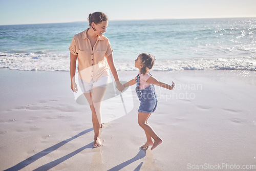 Image of Beach, smile and happy mother with excited girl walking on the sand during summer travel vacation. Wellness, care and freedom with woman and child play together on costa rica family holiday outdoor