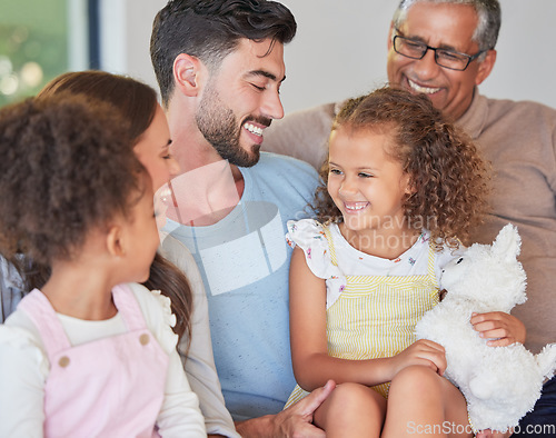 Image of Love, happy and family smile while relax at home with girl, children or kids have fun, bond or enjoy quality time together. Big family, parents and sisters play with mom, dad and senior grandfather