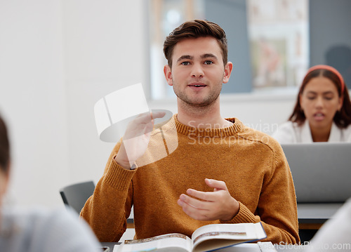 Image of University, lecture and classroom student for question, speaking or talking of research results, book summary or education course. Young man learning knowledge in college school studying information