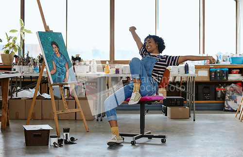 Image of Art, happy and excited woman with painting in studio or design school smiling at finished creative project. Student from India, painter girl and celebration of completed canvas in classroom on chair.