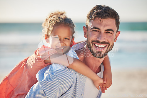 Image of Beach portrait, child smile and father on holiday by the ocean in Dubai for family travel during summer. Happy girl and dad giving hug with care on vacation and freedom by the sea in nature together