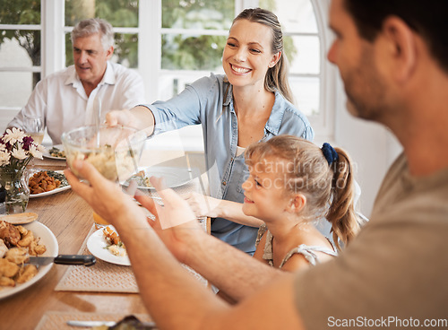 Image of Family, food and lunch meal with child, parents and grandparents sitting together for holiday memories at dining table at home. Happy, bonding and love with men, woman and girl in their Canada house