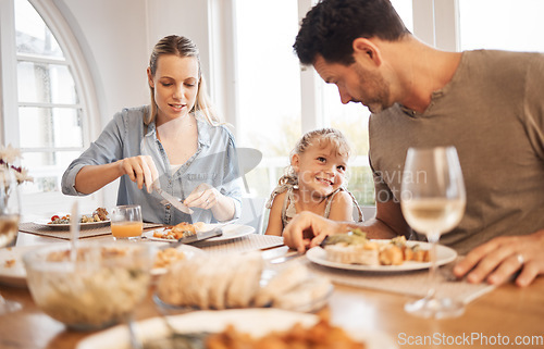 Image of Dining table, family and child bonding with dad while enjoying food together in Canada home. Cute, happy and adorable daughter with smile looking at her father with love and appreciation.