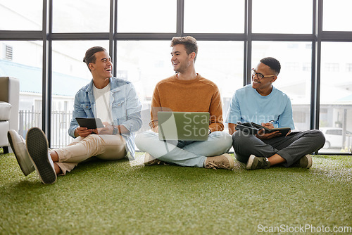 Image of Laptop, tablet and businessmen in creative office working online for startup career. Work, business and digital technology in ecofriendly workplace. Team of men talking on floor in workspace