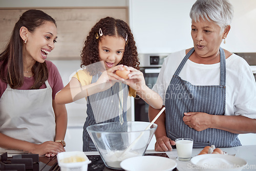 Image of Happy family, child and grandmother cooking in kitchen with flour and egg food learning to make a cake or cookies with women support, love and care. Mexico kid in home baking together for mothers day