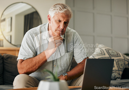 Image of Covid, pcr and laptop with senior man watching online tutorial or video for medical help for self test antigen rapid kit on home sofa. Old male doing nasal swab for coranavuris in Australia house