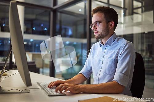 Image of Businessman, computer and night office work for digital programmer, cybersecurity and software design. Thinking web design engineer, developer and worker with technology for ux seo or database coding