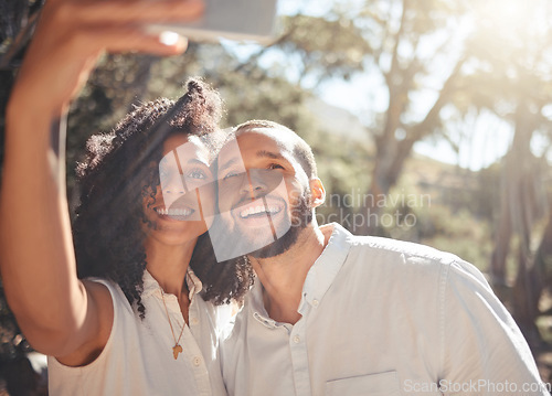 Image of Black couple, smile and phone selfie in nature for summer vacation, adventure and fun together outdoors. Portrait of a happy African man and woman in relationship smiling for photo in South Africa