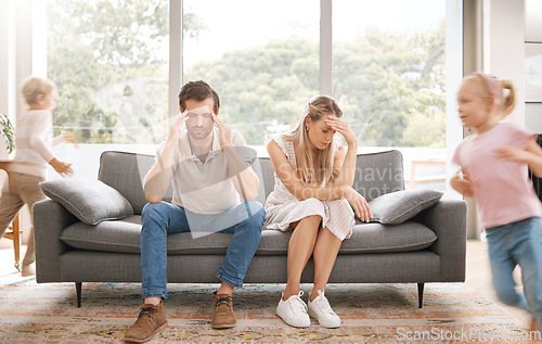 Image of Noise, headache and stress with children and parents in a living room, overwhelmed by adhd kids energy. Burnout, anxiety and family in crisis, suffering from behaviour problem and fatigue