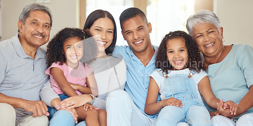 Image of Portrait of happy family time in living room sofa with smile, hug and bonding for love, relax and happiness. Grandparents, parents and children together relaxing in family home, home or house