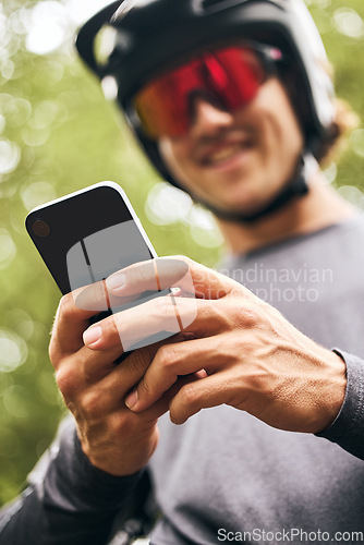 Image of Hands, phone and man rider on social media mobile app, scroll, typing and reading chat text message outdoor. Sports athlete male on 5g smartphone watch social network online video on internet outside