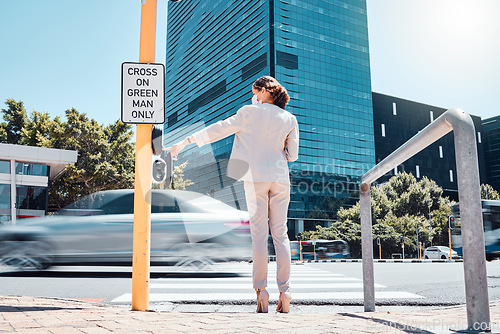 Image of Woman, traffic light button and city road waiting to cross pedestrian to walk or commute to work office building. Female with covid mask at crosswalk by asphalt street while traveling in south africa