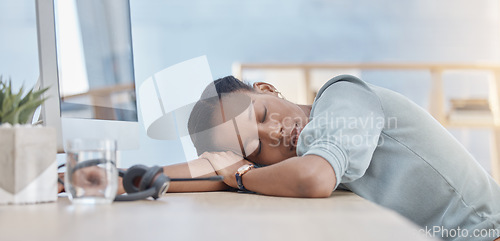 Image of Burnout, call center and sleeping with black woman at desk from overworked, tired and stress. Customer support, consultant and telemarketing with employee at computer exhausted, lazy or resting