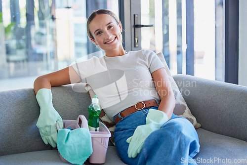 Image of Sofa, cleaning service and business woman in portrait with cleaner product basket and house living room work with home trust. Entrepreneur, small business owner or startup for clean success career