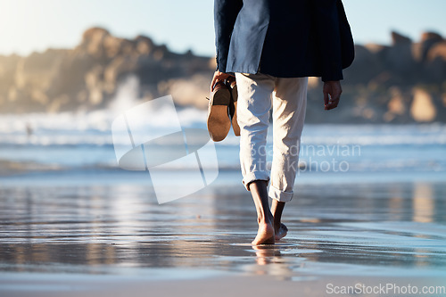 Image of Relax, beach and man walking with shoes in hand for peace, travel and wellness on vacation. Health, travel or summer with feet of guy step in the sand for calm, nature and lifestyle on Brazil holiday