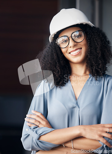 Image of Engineer, technician and black woman with safety helmet, glasses and a smile while working in the construction, architect and engineering industry. Portrait of a happy female worker looking confident