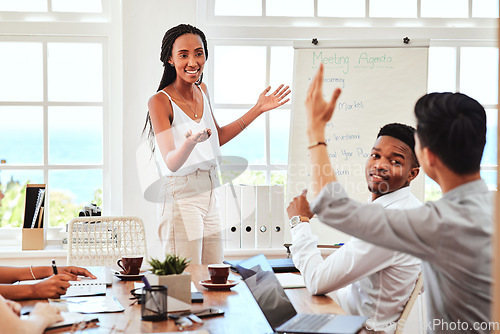 Image of Training, workshop and question with a black woman leader giving presentation in meeting for coaching, learning and data. Collaboration, strategy and teamwork with a man raising hand for interaction