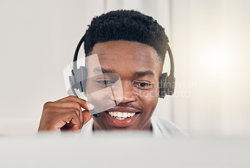 Image of Black man, customer support with a smile and working at call center or telemarketing communication company. Professional digital consultant job, help people with faq and respond to contact us message